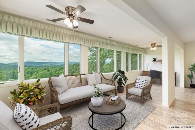 Million Dollar Views and morning sunrises from behind the on Hendersonville Country Club in North Carolina - for sale on GolfHomes.com, golf home, golf lot