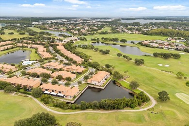 This is a Unique town house in one of the most desirables on Eagle Creek Golf Club in Florida - for sale on GolfHomes.com, golf home, golf lot