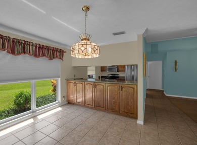Charming 2-Bedroom Home in Hobe Sound's Premier 55+ Community on Eagle Wood Golf Course in Florida - for sale on GolfHomes.com, golf home, golf lot