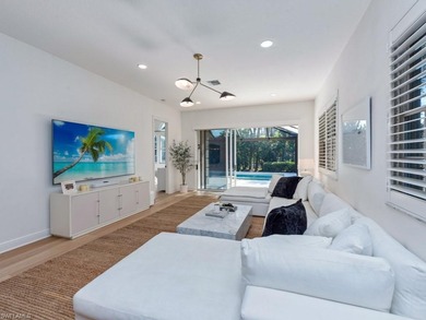 Discover paradise in the Cotton Green enclave of award-winning on The Rookery At Marco in Florida - for sale on GolfHomes.com, golf home, golf lot