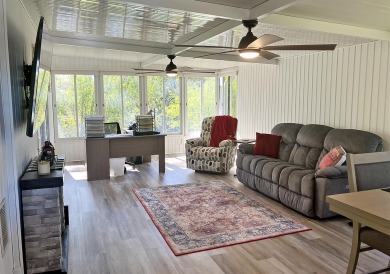 Completely remodeled 1987 Redmen residence with 2 beds, 2 baths on Lake Fairways Country Club in Florida - for sale on GolfHomes.com, golf home, golf lot