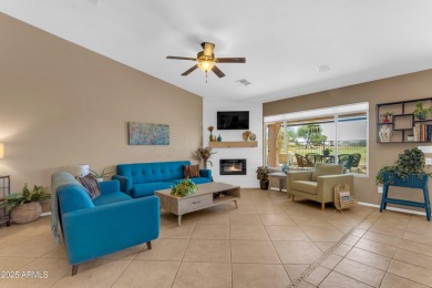 This single level home in The Villages at Queen Creek sits on a on Las Colinas Golf Club in Arizona - for sale on GolfHomes.com, golf home, golf lot