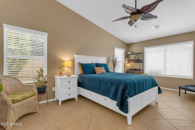 This single level home in The Villages at Queen Creek sits on a on Las Colinas Golf Club in Arizona - for sale on GolfHomes.com, golf home, golf lot
