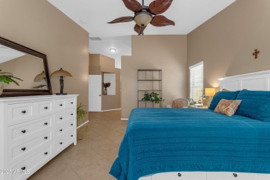This single level home in The Villages at Queen Creek sits on a on Las Colinas Golf Club in Arizona - for sale on GolfHomes.com, golf home, golf lot