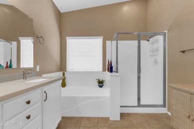 This single level home in The Villages at Queen Creek sits on a on Las Colinas Golf Club in Arizona - for sale on GolfHomes.com, golf home, golf lot