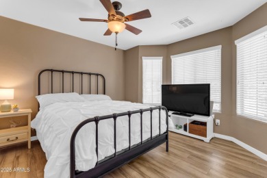This single level home in The Villages at Queen Creek sits on a on Las Colinas Golf Club in Arizona - for sale on GolfHomes.com, golf home, golf lot