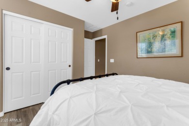 This single level home in The Villages at Queen Creek sits on a on Las Colinas Golf Club in Arizona - for sale on GolfHomes.com, golf home, golf lot