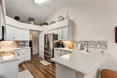 Welcome to refined Florida living in the Plantation at Leesburg on Plantation Golf Club in Florida - for sale on GolfHomes.com, golf home, golf lot