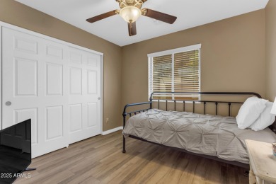 This single level home in The Villages at Queen Creek sits on a on Las Colinas Golf Club in Arizona - for sale on GolfHomes.com, golf home, golf lot
