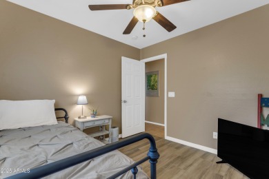 This single level home in The Villages at Queen Creek sits on a on Las Colinas Golf Club in Arizona - for sale on GolfHomes.com, golf home, golf lot