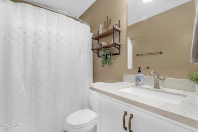 This single level home in The Villages at Queen Creek sits on a on Las Colinas Golf Club in Arizona - for sale on GolfHomes.com, golf home, golf lot