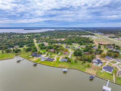 Build your dream home on this extraordinary waterfront lot on on Cedar Creek Country Club in Texas - for sale on GolfHomes.com, golf home, golf lot