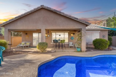 This single level home in The Villages at Queen Creek sits on a on Las Colinas Golf Club in Arizona - for sale on GolfHomes.com, golf home, golf lot