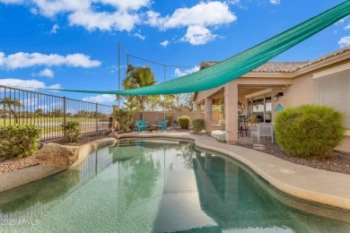 This single level home in The Villages at Queen Creek sits on a on Las Colinas Golf Club in Arizona - for sale on GolfHomes.com, golf home, golf lot