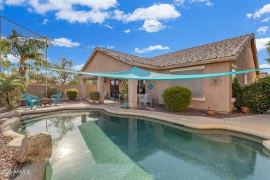 This single level home in The Villages at Queen Creek sits on a on Las Colinas Golf Club in Arizona - for sale on GolfHomes.com, golf home, golf lot