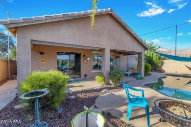 This single level home in The Villages at Queen Creek sits on a on Las Colinas Golf Club in Arizona - for sale on GolfHomes.com, golf home, golf lot