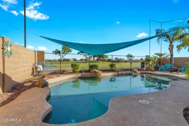 This single level home in The Villages at Queen Creek sits on a on Las Colinas Golf Club in Arizona - for sale on GolfHomes.com, golf home, golf lot