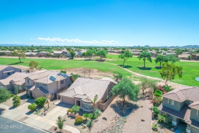 This single level home in The Villages at Queen Creek sits on a on Las Colinas Golf Club in Arizona - for sale on GolfHomes.com, golf home, golf lot