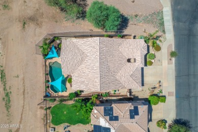 This single level home in The Villages at Queen Creek sits on a on Las Colinas Golf Club in Arizona - for sale on GolfHomes.com, golf home, golf lot