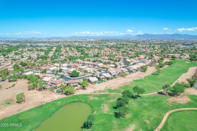 This single level home in The Villages at Queen Creek sits on a on Las Colinas Golf Club in Arizona - for sale on GolfHomes.com, golf home, golf lot