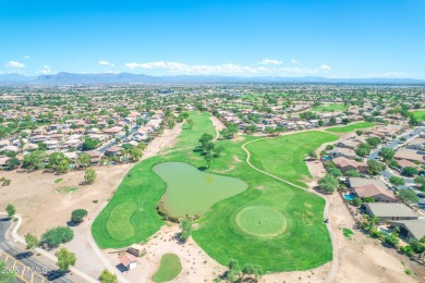 This single level home in The Villages at Queen Creek sits on a on Las Colinas Golf Club in Arizona - for sale on GolfHomes.com, golf home, golf lot