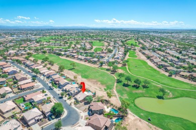 This single level home in The Villages at Queen Creek sits on a on Las Colinas Golf Club in Arizona - for sale on GolfHomes.com, golf home, golf lot