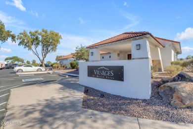 This single level home in The Villages at Queen Creek sits on a on Las Colinas Golf Club in Arizona - for sale on GolfHomes.com, golf home, golf lot