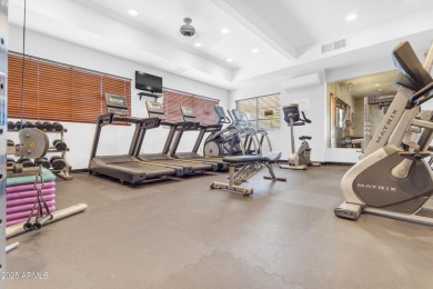 This single level home in The Villages at Queen Creek sits on a on Las Colinas Golf Club in Arizona - for sale on GolfHomes.com, golf home, golf lot