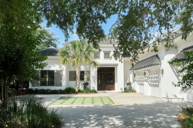 Discover the perfect fusion of modern elegance and artistic on Regatta Bay Golf and Country Club in Florida - for sale on GolfHomes.com, golf home, golf lot