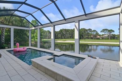Discover the perfect fusion of modern elegance and artistic on Regatta Bay Golf and Country Club in Florida - for sale on GolfHomes.com, golf home, golf lot