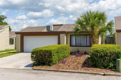 Charming 3-bedroom, 2-bath home with 1,464 sq ft of living space on Beacon Woods Golf Club in Florida - for sale on GolfHomes.com, golf home, golf lot