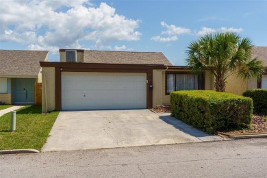 Charming 3-bedroom, 2-bath home with 1,464 sq ft of living space on Beacon Woods Golf Club in Florida - for sale on GolfHomes.com, golf home, golf lot