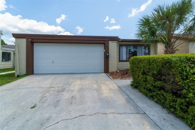 Charming 3-bedroom, 2-bath home with 1,464 sq ft of living space on Beacon Woods Golf Club in Florida - for sale on GolfHomes.com, golf home, golf lot