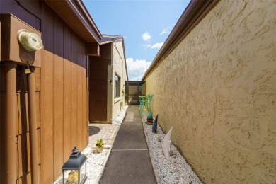Charming 3-bedroom, 2-bath home with 1,464 sq ft of living space on Beacon Woods Golf Club in Florida - for sale on GolfHomes.com, golf home, golf lot