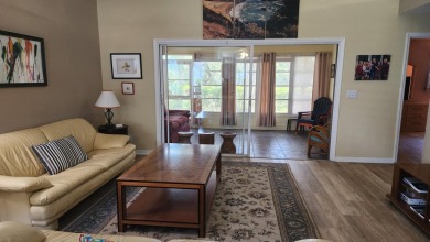COME TAKE ADVANTAGE OF THIS FANTASTIC GOLF VILLA WITH NEW A/C on Gator Trace Golf and Country Club in Florida - for sale on GolfHomes.com, golf home, golf lot