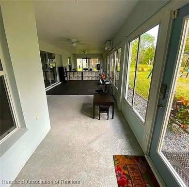 Enormous 3-Bedroom, 2-Bathroom Custom Home + Den in The on Sun n Lake Golf and Country Club in Florida - for sale on GolfHomes.com, golf home, golf lot