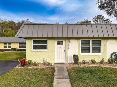 Impressive and charming! You're going to love this updated 2 on Summertree Golf Course in Florida - for sale on GolfHomes.com, golf home, golf lot