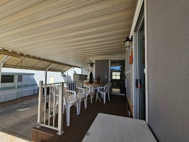 Situated in the vibrant Viewpoint Golf Resort 55+ community on Viewpoint Golf Resort in Arizona - for sale on GolfHomes.com, golf home, golf lot