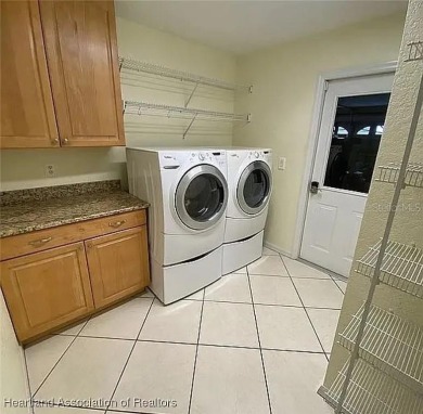 Enormous 3-Bedroom, 2-Bathroom Custom Home + Den in The on Sun n Lake Golf and Country Club in Florida - for sale on GolfHomes.com, golf home, golf lot