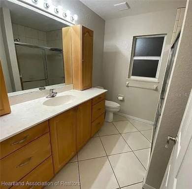 Enormous 3-Bedroom, 2-Bathroom Custom Home + Den in The on Sun n Lake Golf and Country Club in Florida - for sale on GolfHomes.com, golf home, golf lot