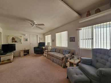 Situated in the vibrant Viewpoint Golf Resort 55+ community on Viewpoint Golf Resort in Arizona - for sale on GolfHomes.com, golf home, golf lot