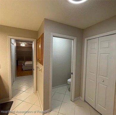 Enormous 3-Bedroom, 2-Bathroom Custom Home + Den in The on Sun n Lake Golf and Country Club in Florida - for sale on GolfHomes.com, golf home, golf lot