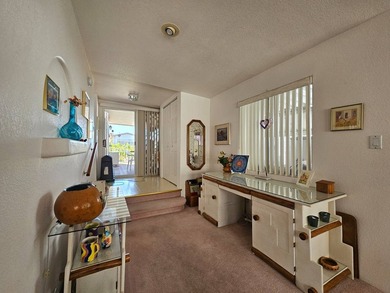 Situated in the vibrant Viewpoint Golf Resort 55+ community on Viewpoint Golf Resort in Arizona - for sale on GolfHomes.com, golf home, golf lot