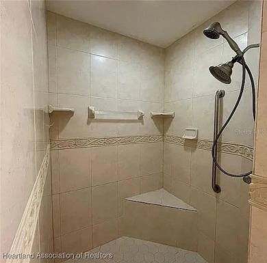 Enormous 3-Bedroom, 2-Bathroom Custom Home + Den in The on Sun n Lake Golf and Country Club in Florida - for sale on GolfHomes.com, golf home, golf lot