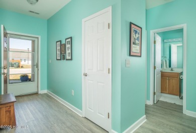 A rarely available 2 bedroom 2 bath unit in Palmetto Place in on North River Club in North Carolina - for sale on GolfHomes.com, golf home, golf lot