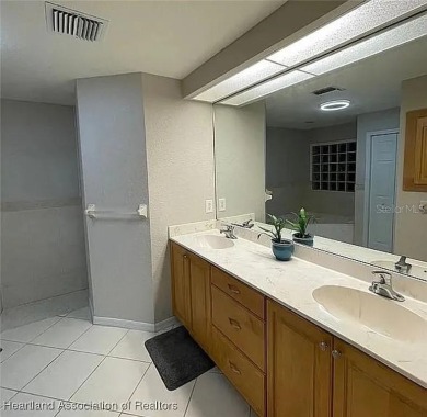 Enormous 3-Bedroom, 2-Bathroom Custom Home + Den in The on Sun n Lake Golf and Country Club in Florida - for sale on GolfHomes.com, golf home, golf lot