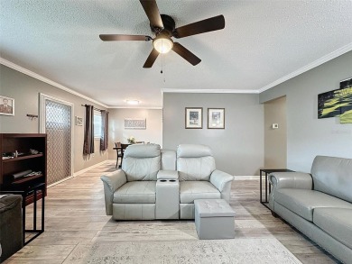 Impressive and charming! You're going to love this updated 2 on Summertree Golf Course in Florida - for sale on GolfHomes.com, golf home, golf lot