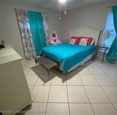 Enormous 3-Bedroom, 2-Bathroom Custom Home + Den in The on Sun n Lake Golf and Country Club in Florida - for sale on GolfHomes.com, golf home, golf lot