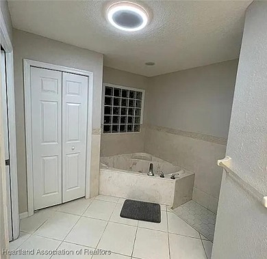 Enormous 3-Bedroom, 2-Bathroom Custom Home + Den in The on Sun n Lake Golf and Country Club in Florida - for sale on GolfHomes.com, golf home, golf lot