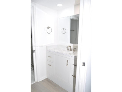 Totally remodeled,  new look,  spacious and beautiful  2/2 FIRST on Flamingo Lakes Country Club in Florida - for sale on GolfHomes.com, golf home, golf lot
